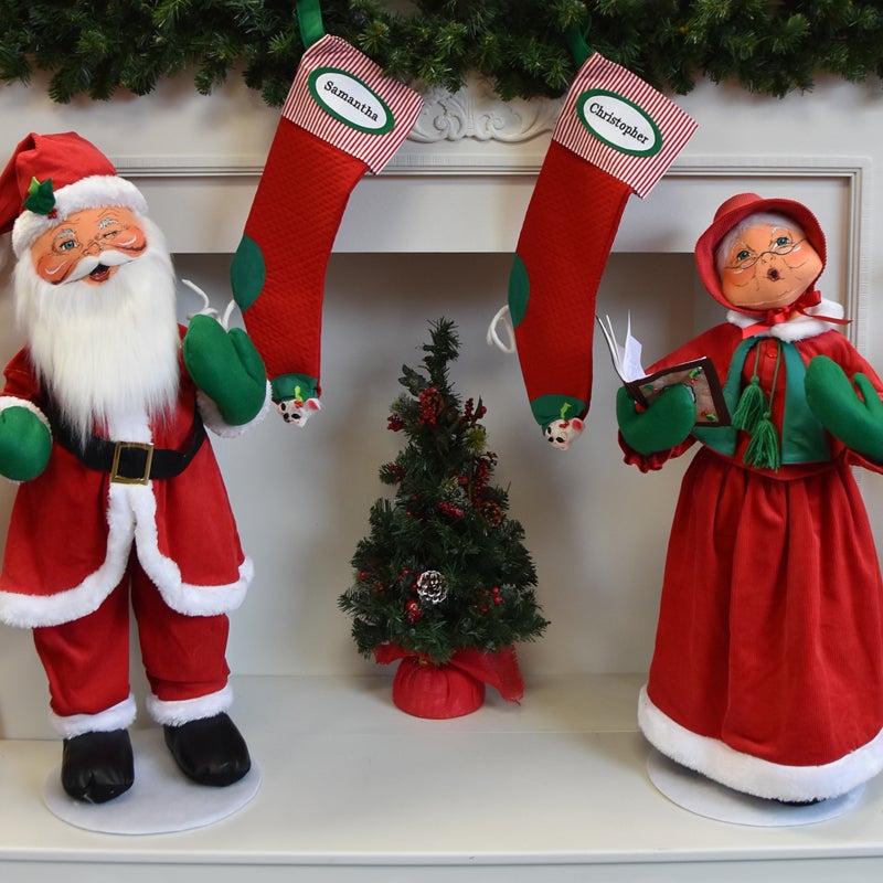 Personalized stocking shown on fireplace