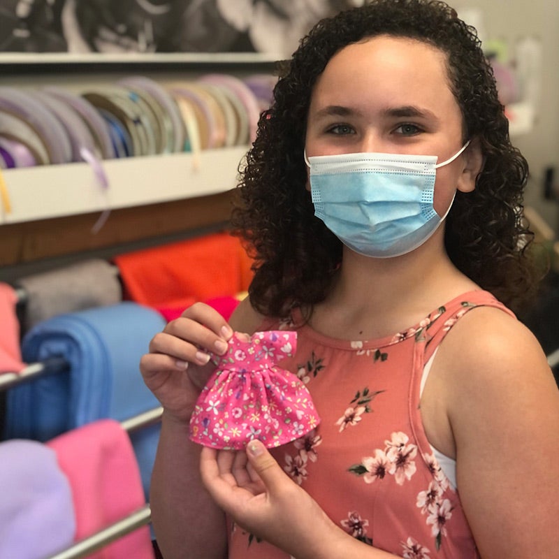 Hannah-Picking-Out-Dress Young Doll Designer